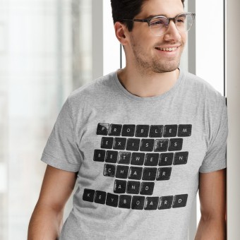 Problem Exists Between Chair and Keyboard T-Shirt
